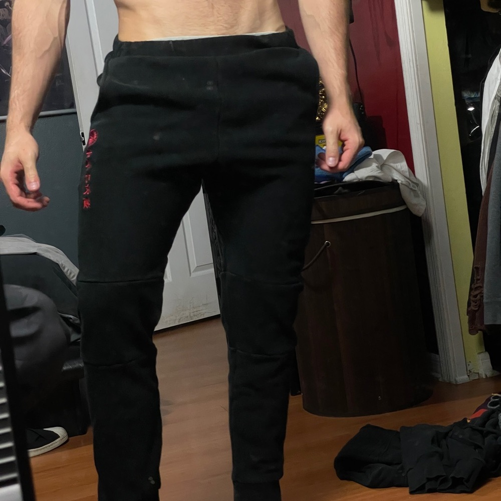 black sweatpants - asian lettering